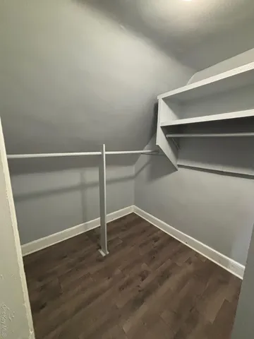 a view of an empty walk in closet