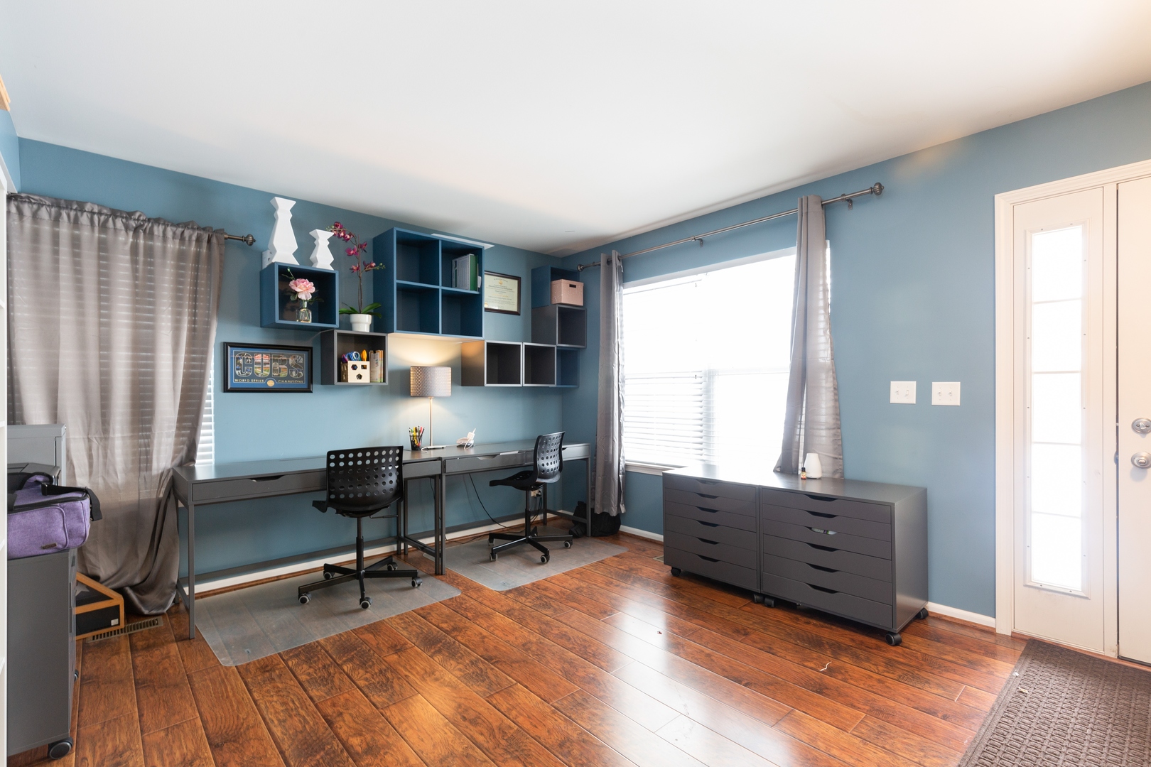 26 Boathouse Road Pingree Grove, IL 60140 - Photo 2 of 12 a view of a workspace with furniture and a window