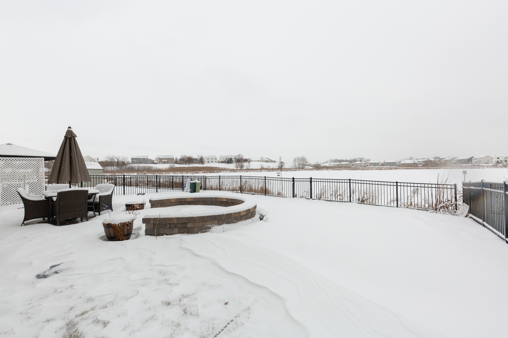 26 Boathouse Road Pingree Grove, IL 60140 - Photo 12 of 12 a view of a lake with a terrace