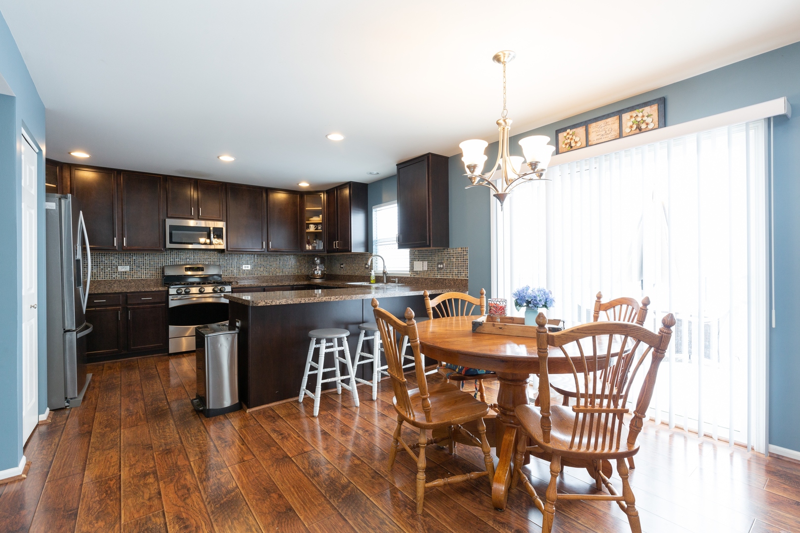 26 Boathouse Road Pingree Grove, IL 60140 - Photo 5 of 12 a view of a dining room with furniture window and outside view