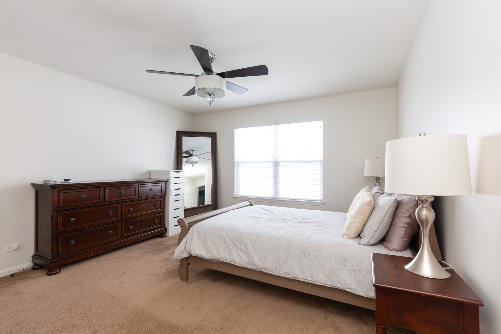 26 Boathouse Road Pingree Grove, IL 60140 - Photo 7 of 12 a bedroom with a bed and window