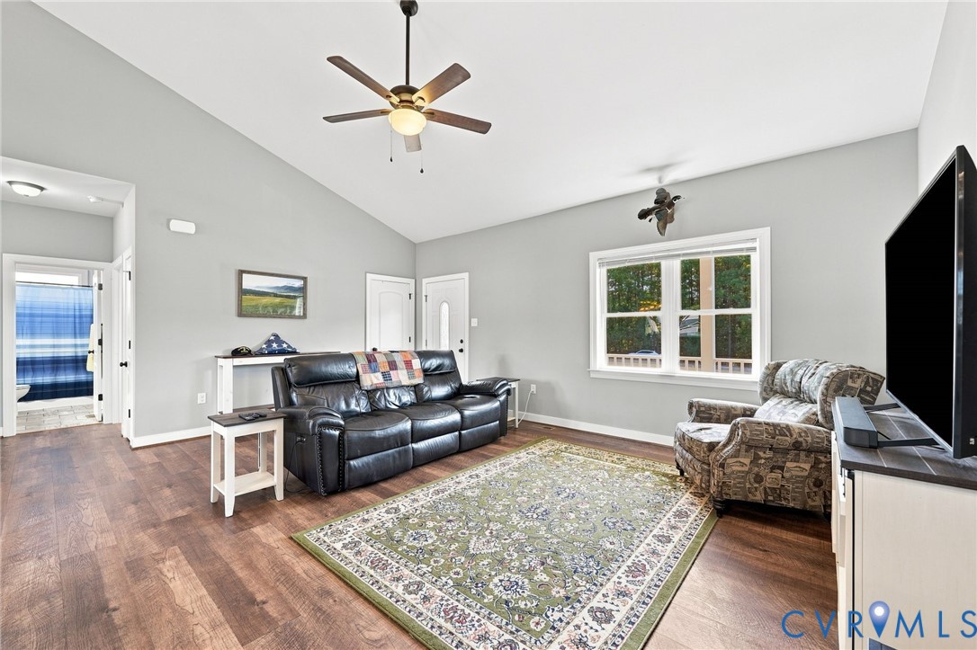 8718 Rock Cedar Road New Kent, VA 23124 - Photo 11 of 43 Vaulted ceiling, wood-finish flooring, white trim,