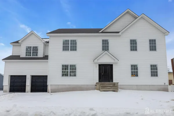 a front view of a house with glass windows