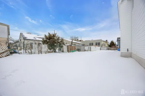 a view of swimming pool with a yard
