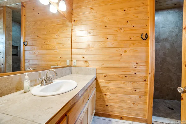 a bedroom with a bed and a walk in closet