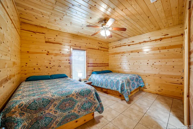 a bedroom with a bed and a walk in closet