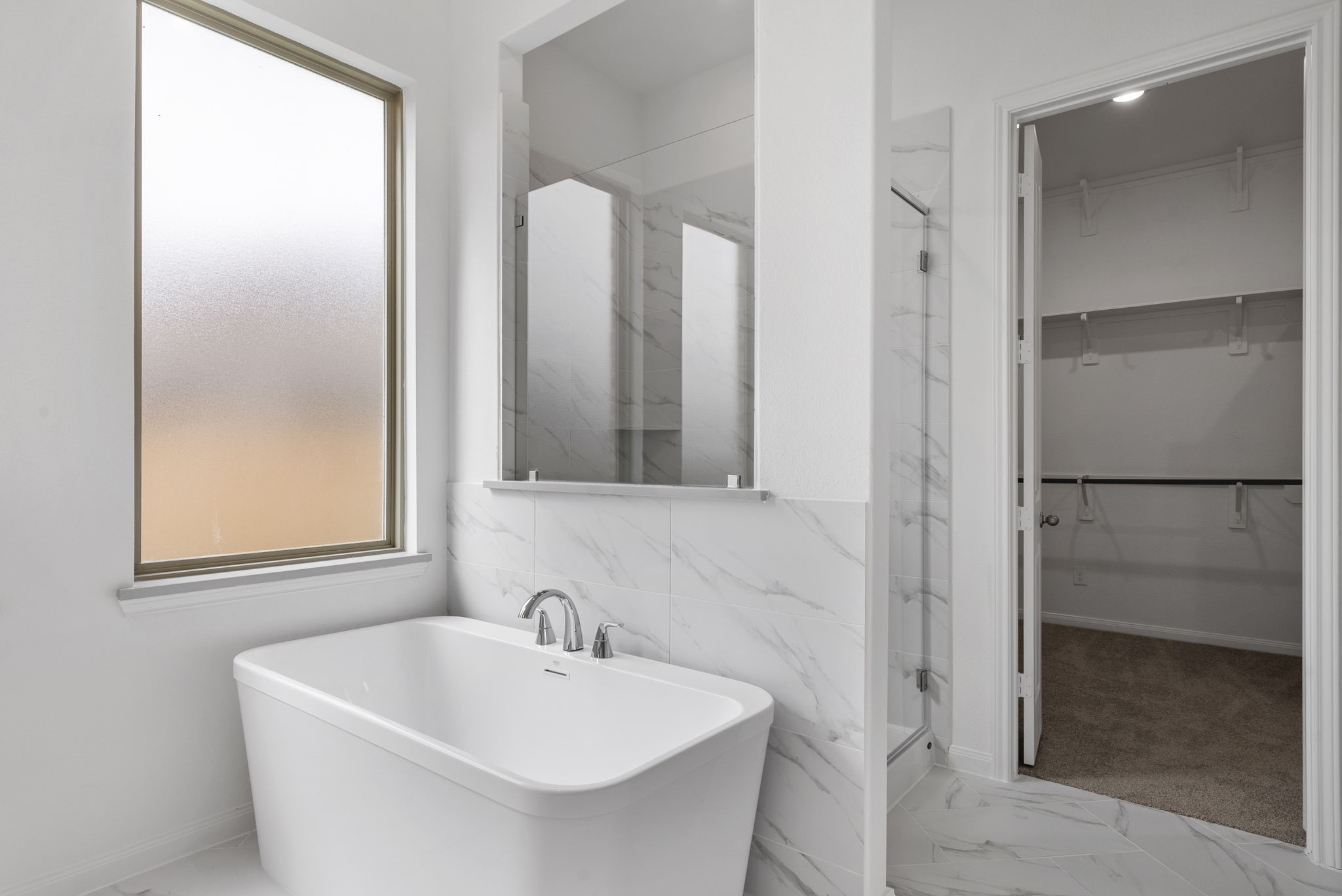 18810 Forested Street Manvel, TX 77578 - Photo 24 of 35 a bathroom with a sink and a mirror