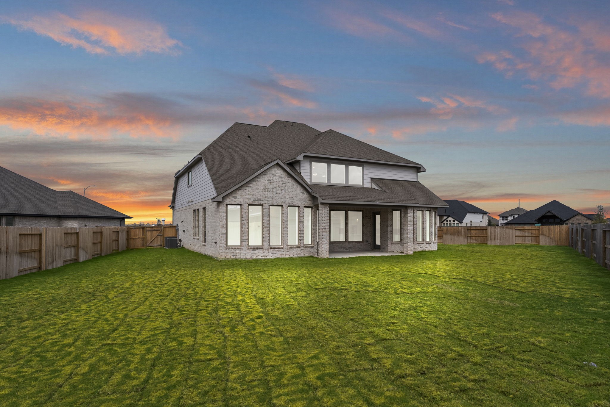 18810 Forested Street Manvel, TX 77578 - Photo 27 of 35 a view of a house with a big yard and large trees