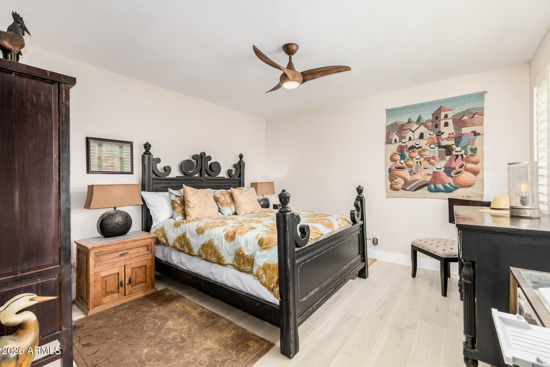 26055 North Bravo Lane Rio Verde, AZ 85263 - Photo 14 of 26 a bed room with furniture and a window
