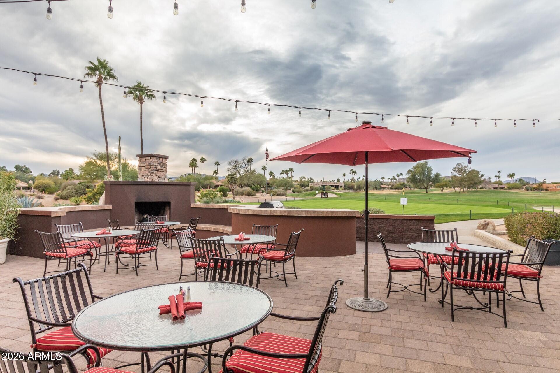 26055 North Bravo Lane Rio Verde, AZ 85263 - Photo 22 of 26 an outdoor space with furniture and umbrella
