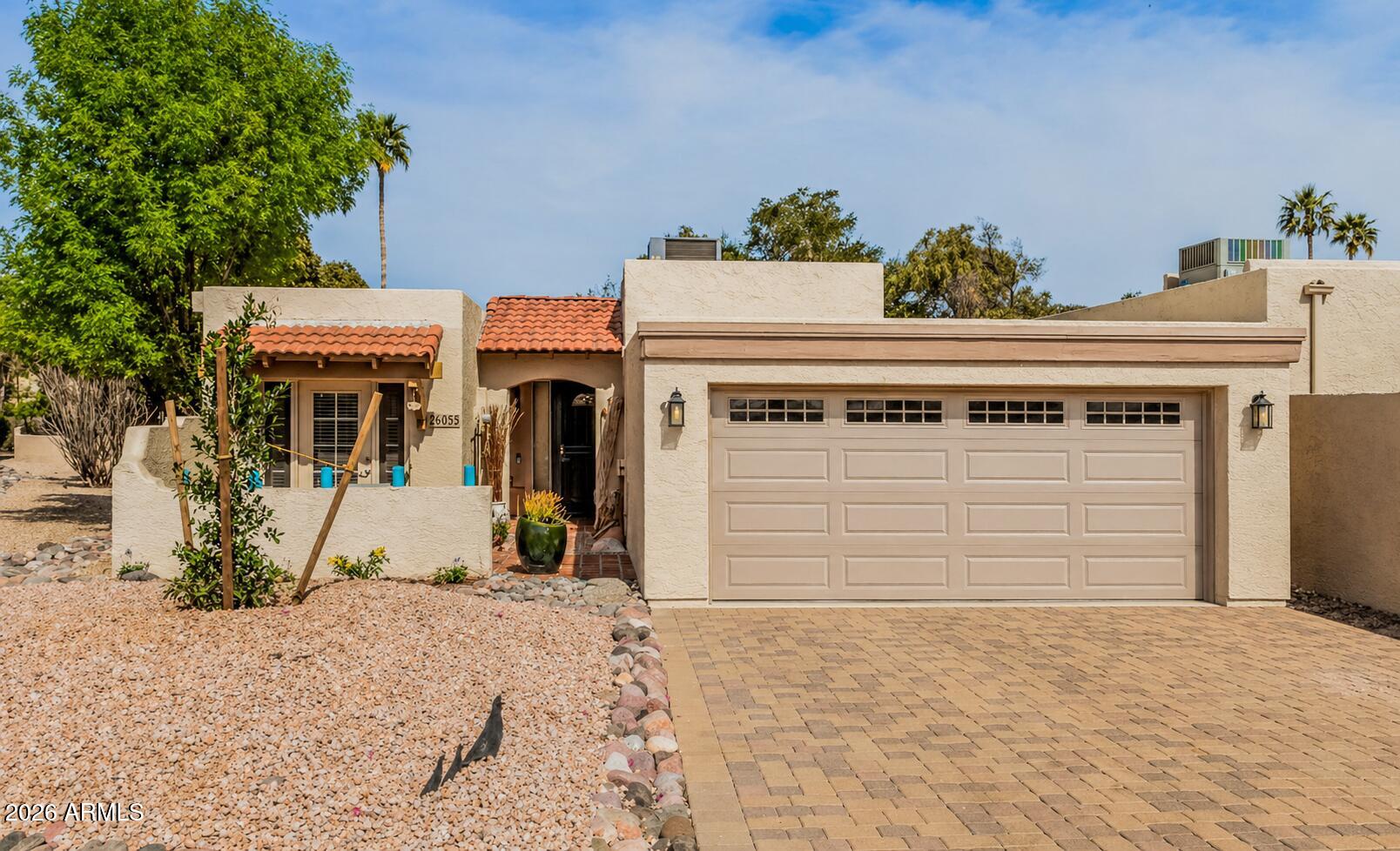 26055 North Bravo Lane Rio Verde, AZ 85263 - Photo 3 of 26 a front view of a house with a yard