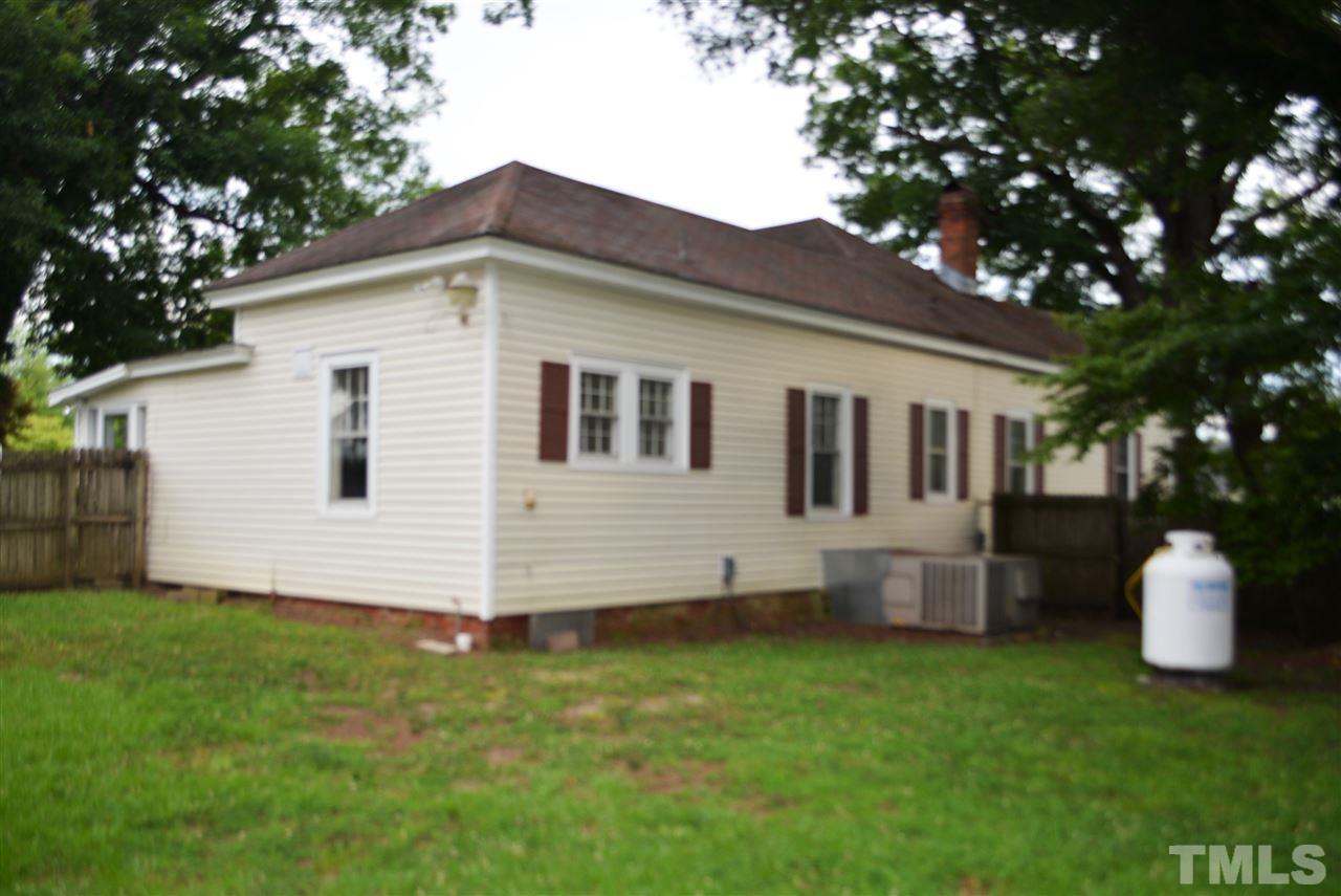 317 South Walnut Street Spring Hope, NC 27882 - Photo 12 of 14 a view of a back yard of the house