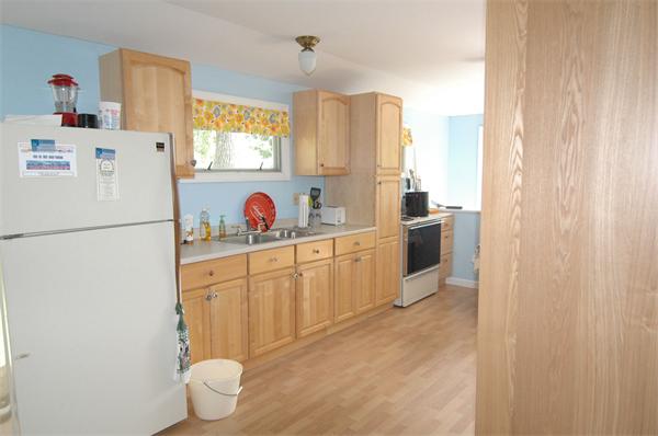 1 Burma Road Phillipston, MA 01331 - Photo 2 of 11 a kitchen with stainless steel appliances a refrigerator sink and white cabinets