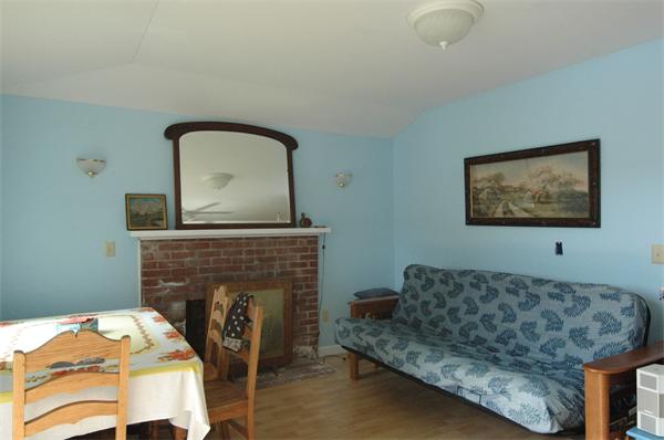 1 Burma Road Phillipston, MA 01331 - Photo 4 of 11 a living room with furniture and a fireplace