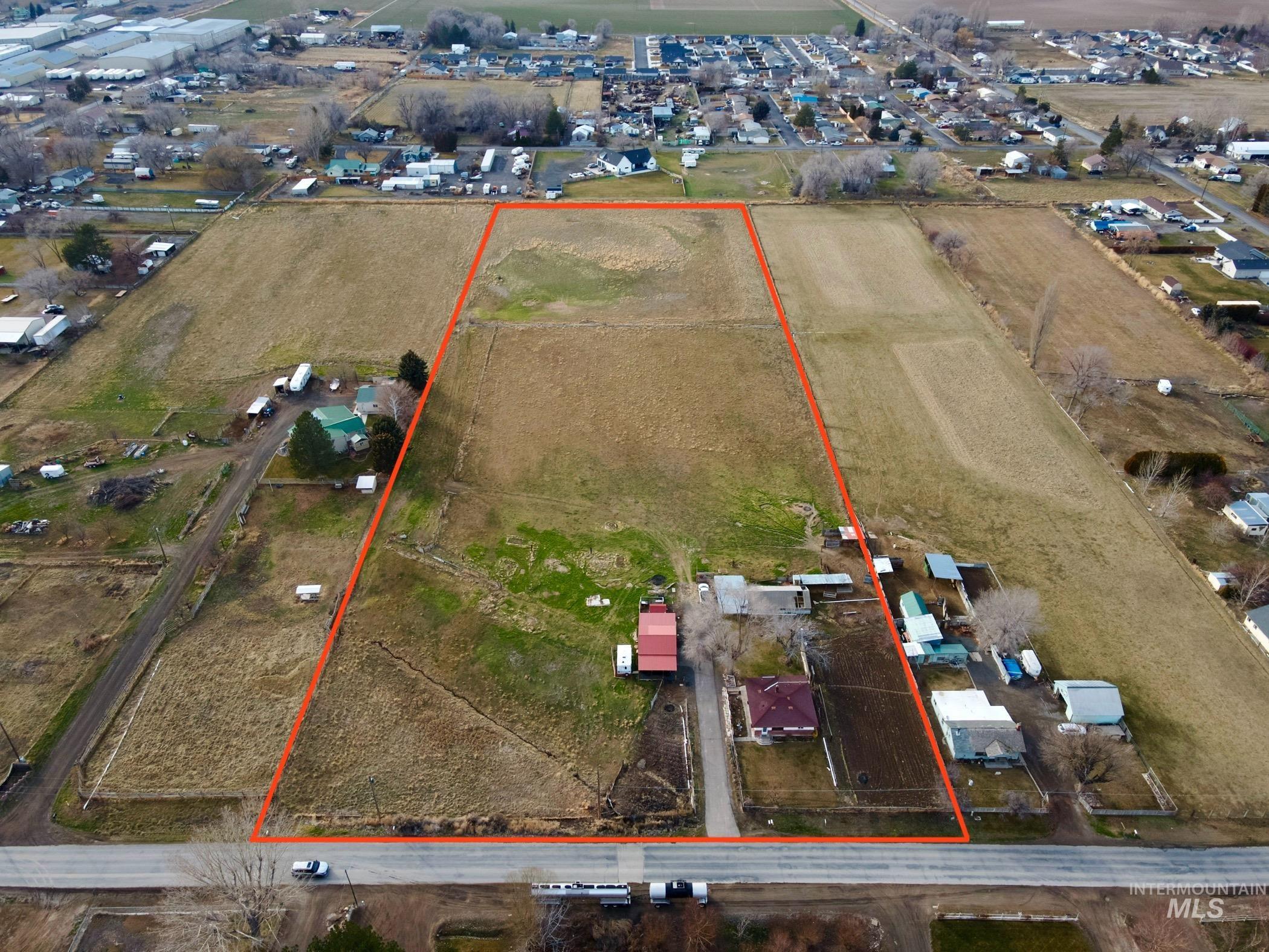 3989 North 2250 East Filer, ID 83328 - Photo 1 of 26 Aerial view of property's location featuring property boundaries highlighted and rural landscape