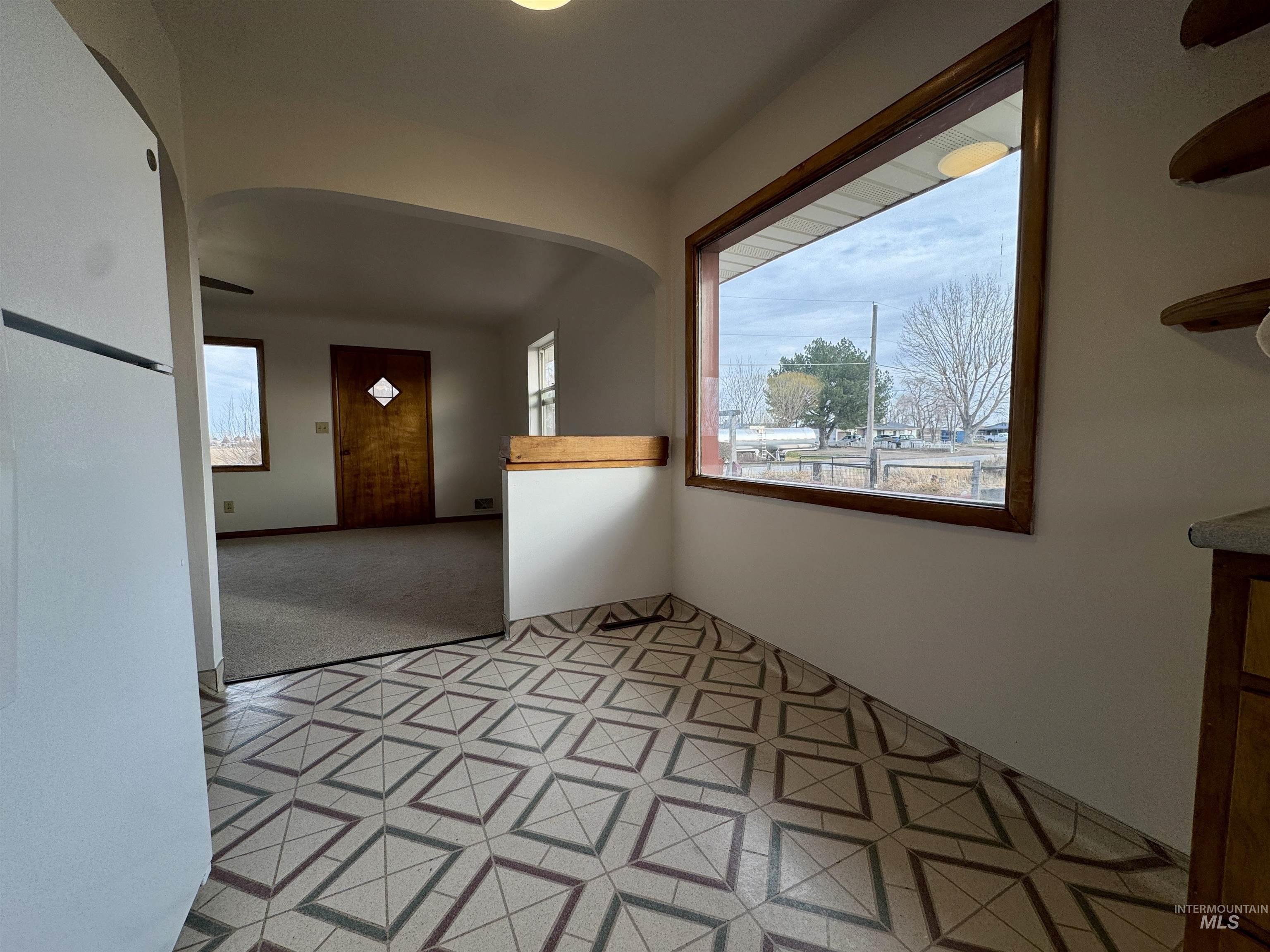 3989 North 2250 East Filer, ID 83328 - Photo 14 of 26 Unfurnished room featuring arched walkways