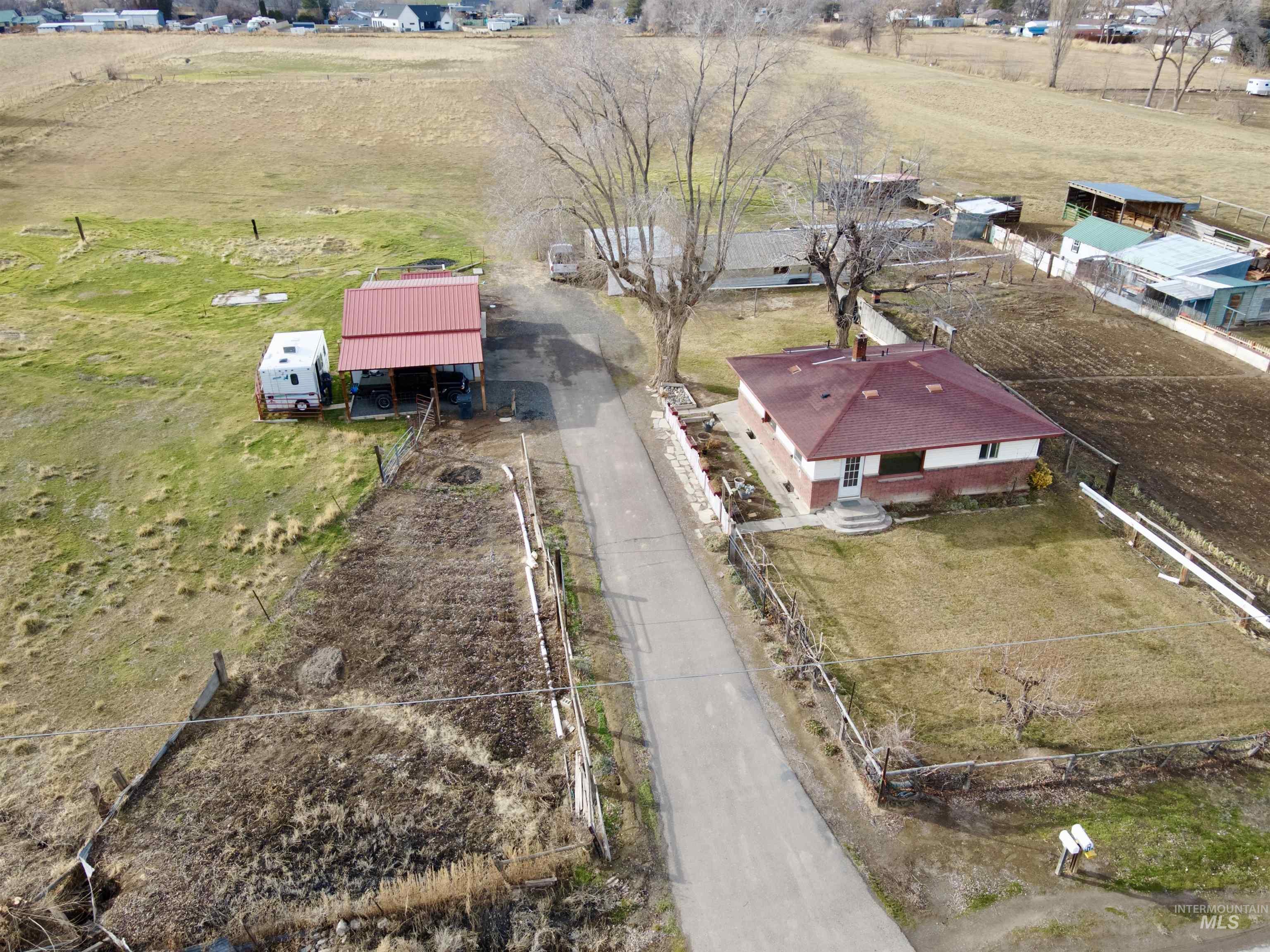 3989 North 2250 East Filer, ID 83328 - Photo 21 of 26 Aerial view of property and surrounding area with rural landscape