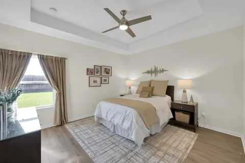 a kitchen with cabinets stainless steel appliances a sink and a stove
