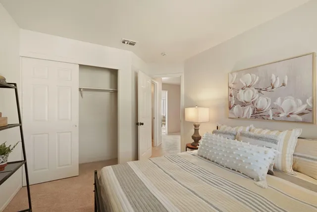 a bathroom with a double vanity sink shower and a mirror