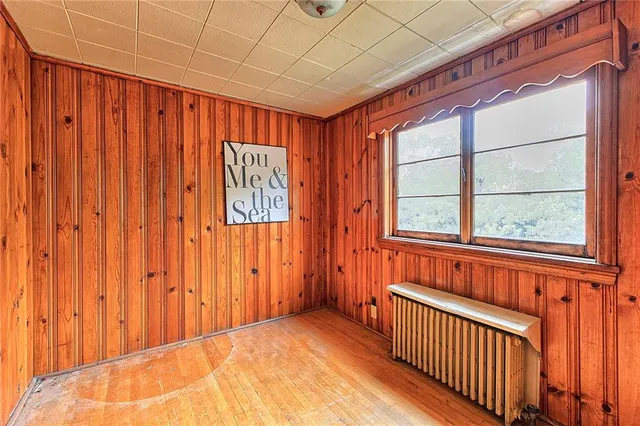 a view of a room with large window