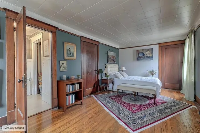 a living room with furniture and a rug
