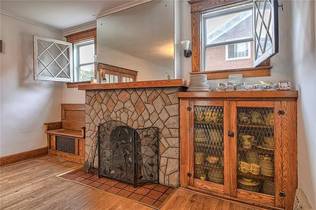 a view of an entryway with wooden floor