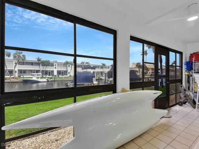 a view of a floor to ceiling window with a washer and dryer