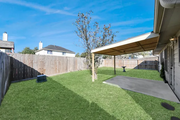 a view of a backyard with a garden