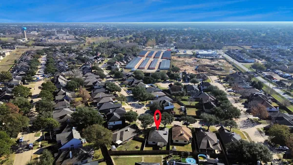 an aerial view of multiple house