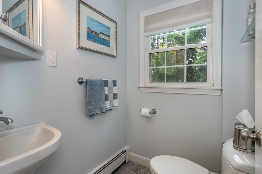 24 Mohawk Road Canton, MA 02021 - Photo 14 of 34 a bathroom with a toilet and a sink