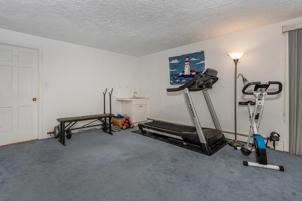 24 Mohawk Road Canton, MA 02021 - Photo 27 of 34 a view of a room with gym equipment