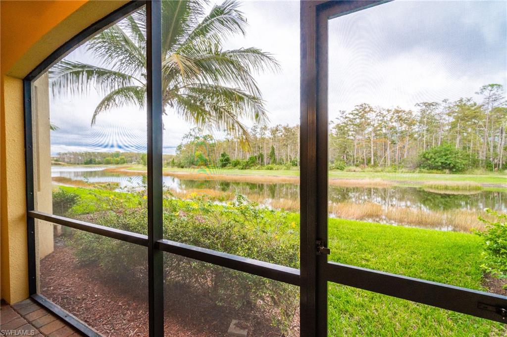 9596 Trevi Court, Unit 5414 Naples, FL 34113 - Photo 20 of 34 a view of lake from a window