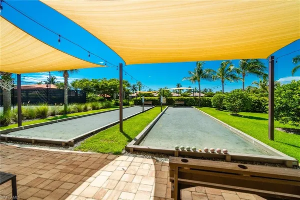 a view of a backyard with sitting area