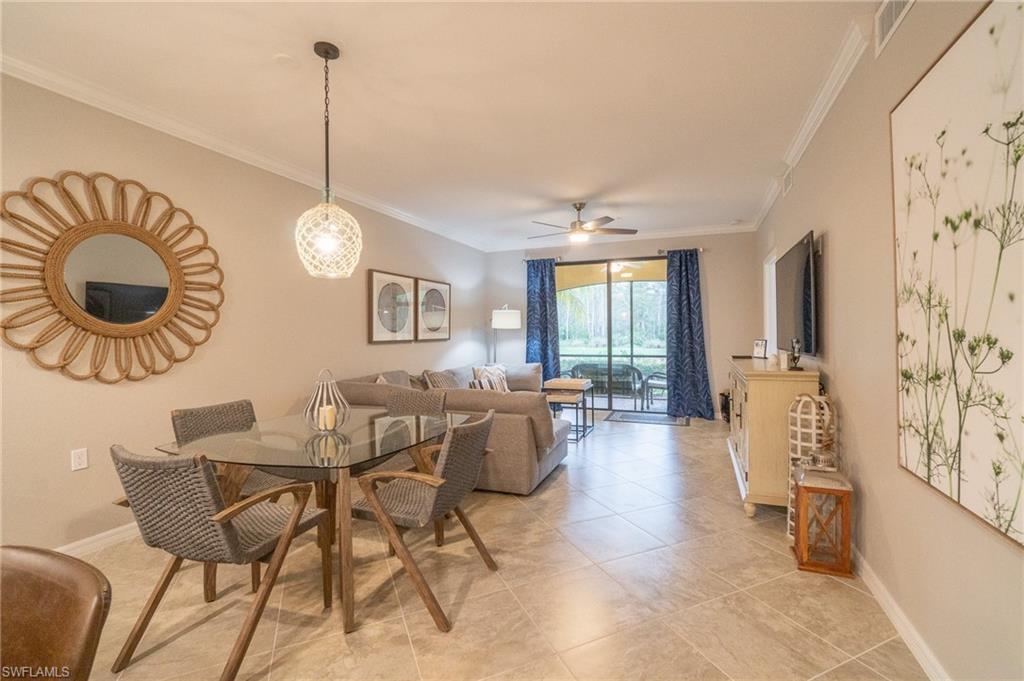 9596 Trevi Court, Unit 5414 Naples, FL 34113 - Photo 5 of 34 a view of a livingroom with furniture and window