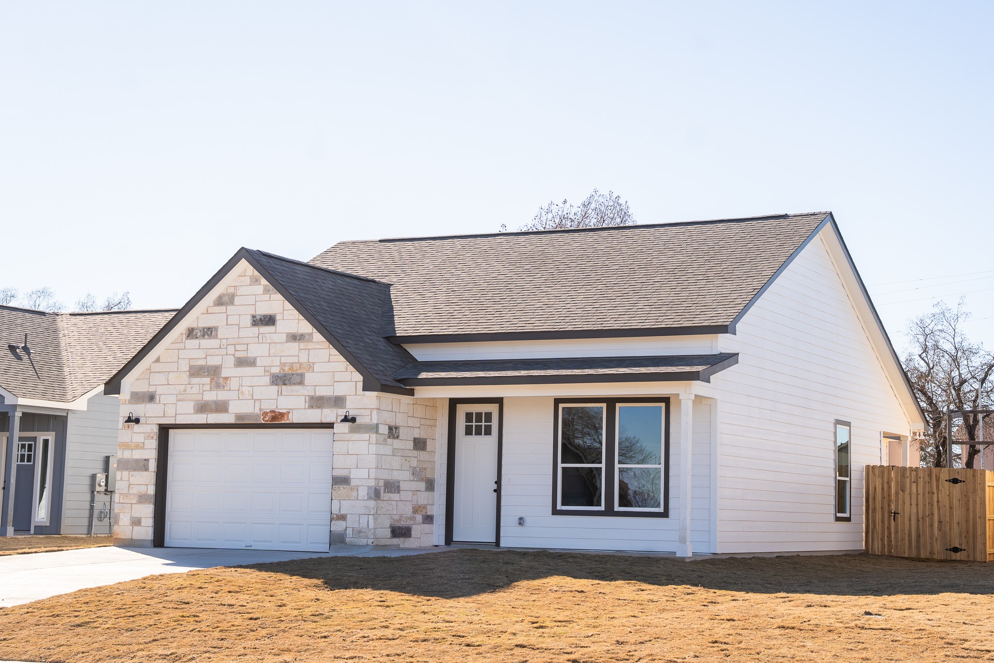 313 String Prairie Way Smithville, TX 78957 - Photo 2 of 18 a view of a house with large windows