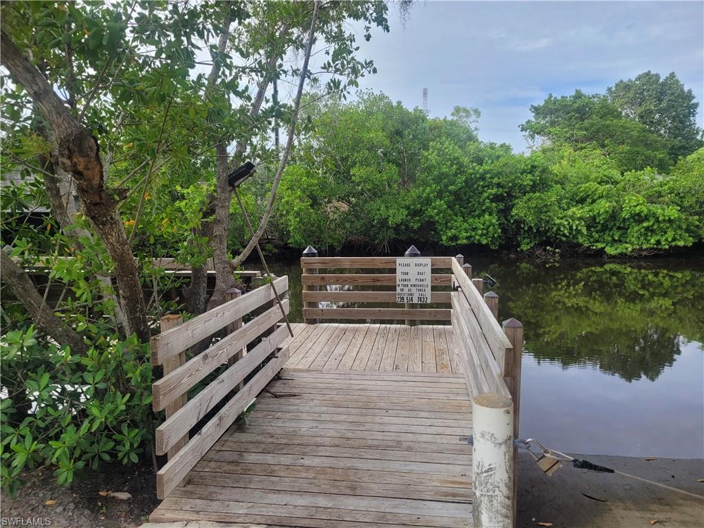 859 Manatee Road Naples, FL 34114 - Photo 23 of 37 Dock featuring a water view