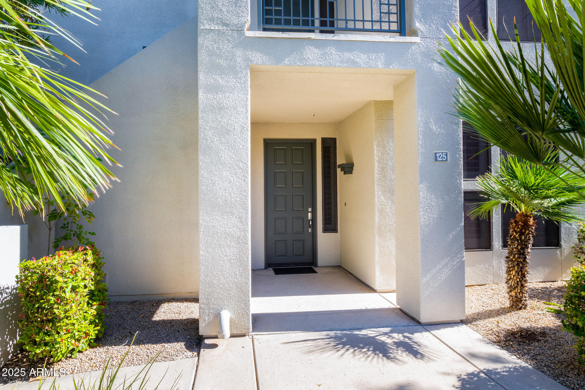 7700 East Gainey Ranch Road, Unit 125 Scottsdale, AZ 85258 - Photo 2 of 46 a view of a entryway of the house