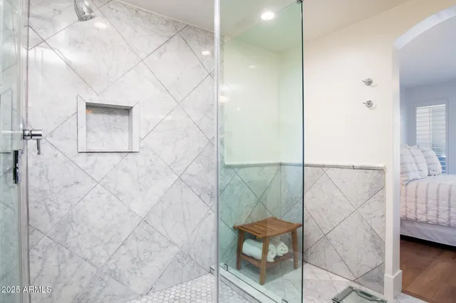 a bathroom with a double vanity sink and mirror