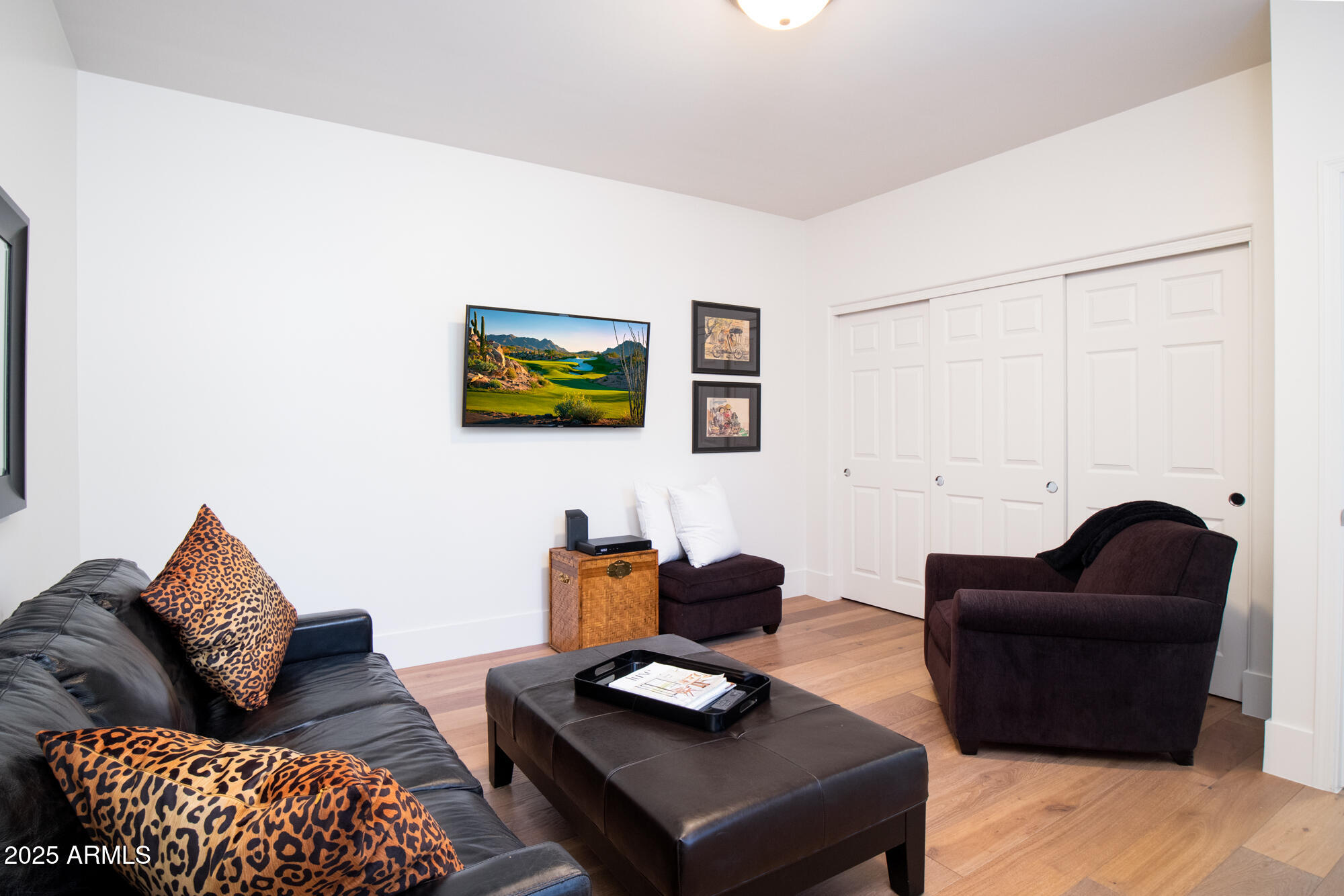 7700 East Gainey Ranch Road, Unit 125 Scottsdale, AZ 85258 - Photo 27 of 46 a living room with furniture and a couch