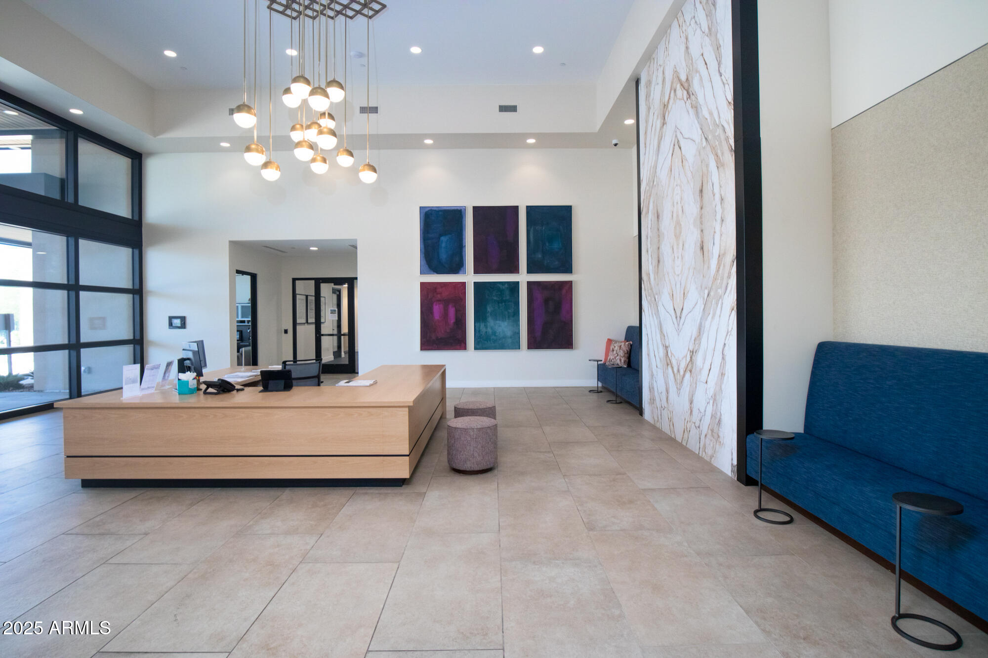 7700 East Gainey Ranch Road, Unit 125 Scottsdale, AZ 85258 - Photo 42 of 46 a spacious bedroom with bed and window