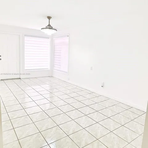 a view of a room & window