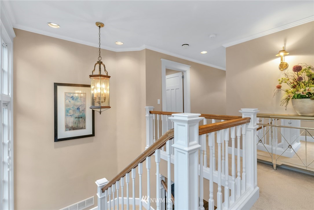3808 Hunts Point Road Hunts Point, WA 98004 - Photo 19 of 24 a view of a hallway with seating area