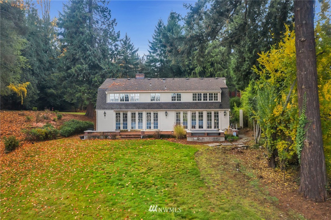 3808 Hunts Point Road Hunts Point, WA 98004 - Photo 6 of 24 a view of a house with backyard and sitting area