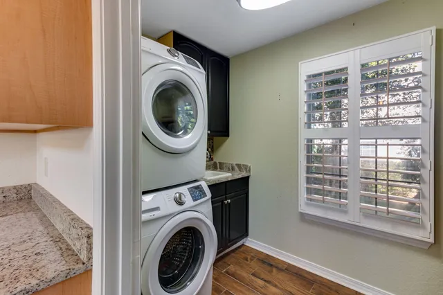 a view of livingroom with washer and dryer