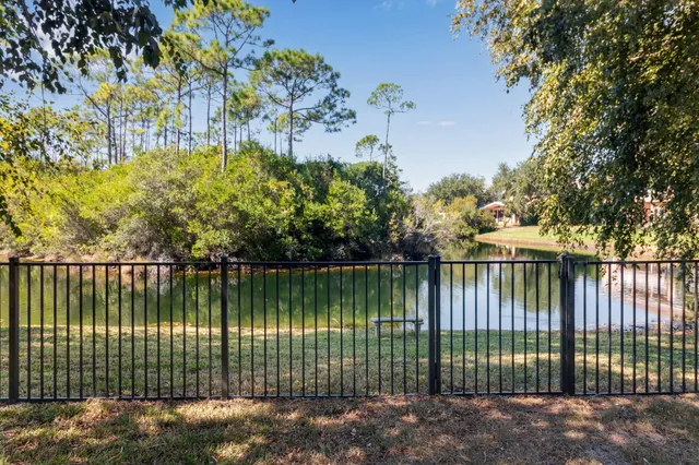 a view of a lake from a garden