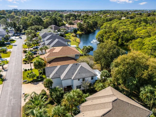 an aerial view of a house with a garden