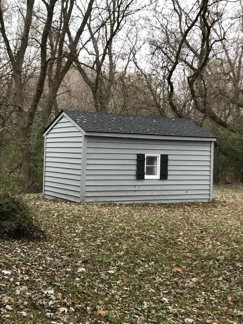 2704 South Red Barn Road Crystal Lake, IL 60012 - Photo 17 of 17 a backyard of a house with lots of green space