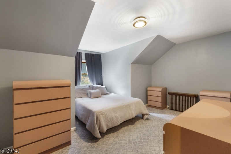 312 Naughright Road Long Valley, NJ 07853 - Photo 20 of 32 a bedroom with a bed and a cabinets