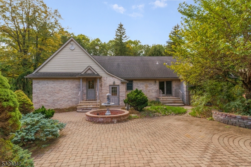 312 Naughright Road Long Valley, NJ 07853 - Photo 24 of 32 a backyard of a house with table and chairs