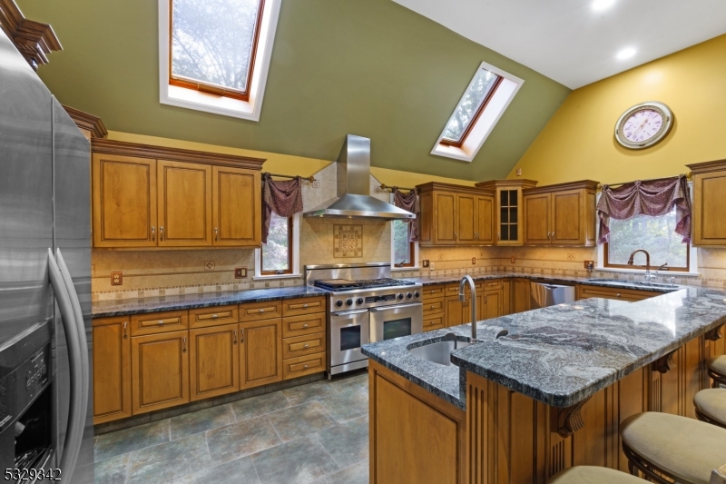 312 Naughright Road Long Valley, NJ 07853 - Photo 6 of 32 a kitchen with a stove and cabinets